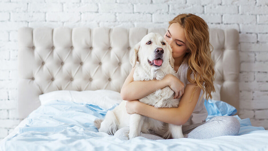 girl with golden retriever dog